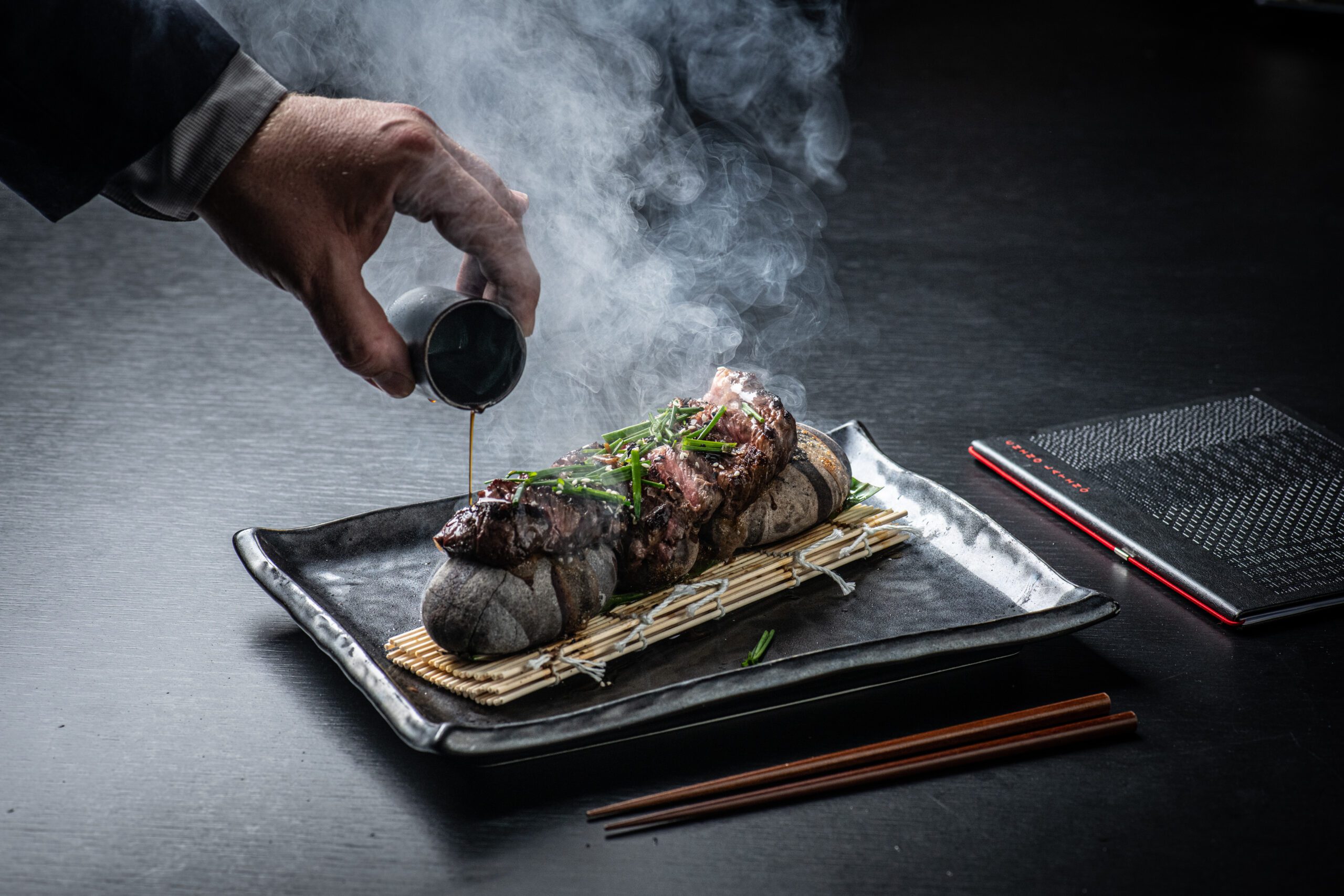 Final Rb Chino Latino Hot Rocks Steak Pouring Scaled