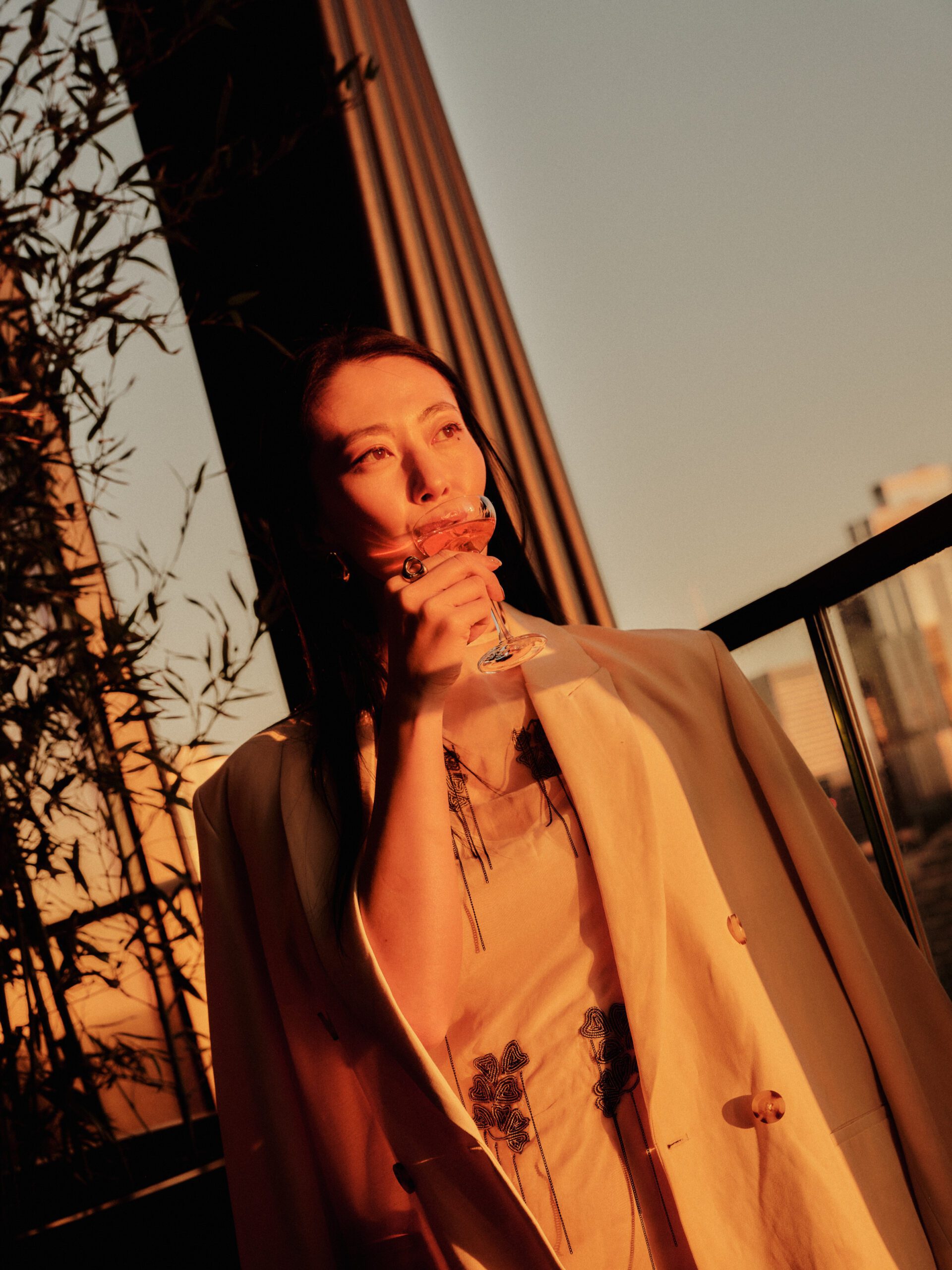 Woman Having A Cocktail On The Terrace